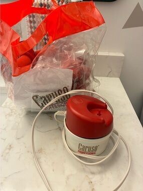 Caruso Professional steam curlers. Variety of sizes! Lots of curlers included